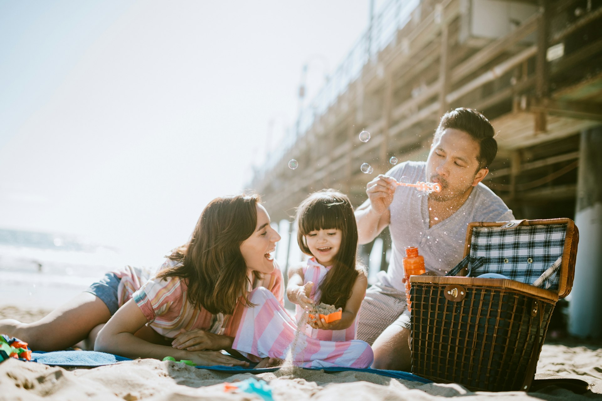 Loving Family Enjoying Sun at Los Angeles Beach